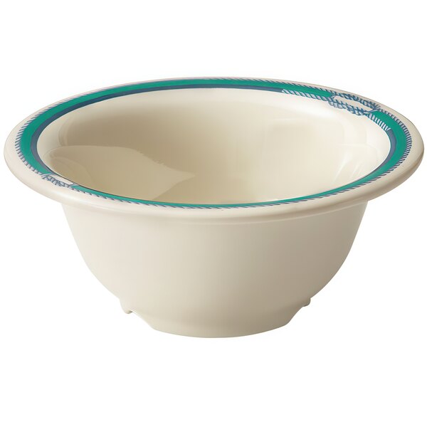 A white bowl with blue trim.