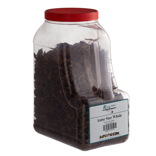 A plastic container with brown Regal Whole Star Anise.
