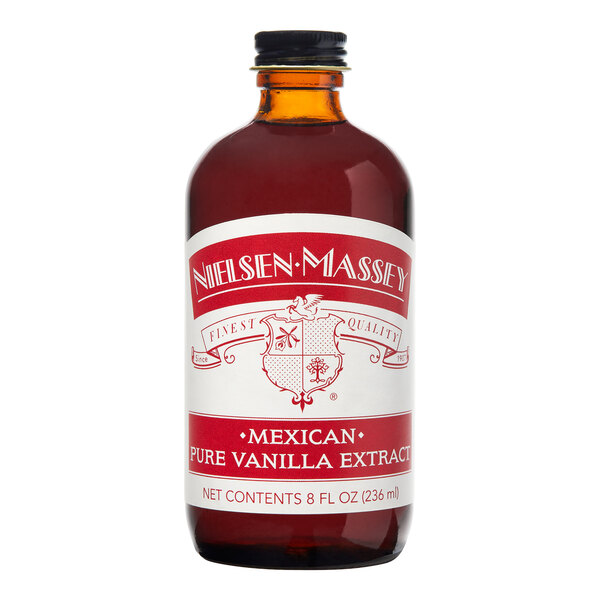 A close up of a bottle of Nielsen-Massey Mexican Vanilla Extract with a white label.