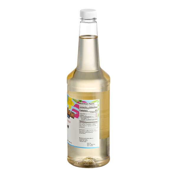 A clear plastic bottle filled with coconut snow cone syrup and sealed with a white cap.