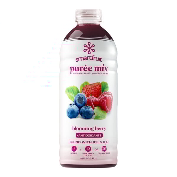 A white bottle of Smartfruit Blooming Berry puree with berries on the label.