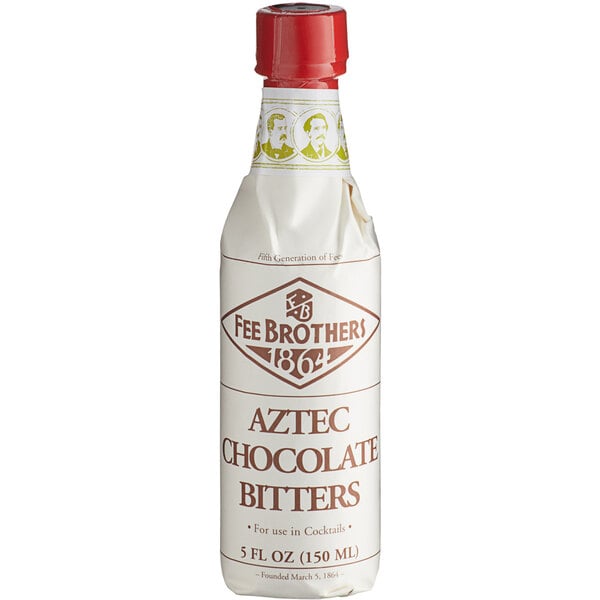 A white plastic bottle of Fee Brothers Aztec Chocolate Bitters with a red cap and brown label.