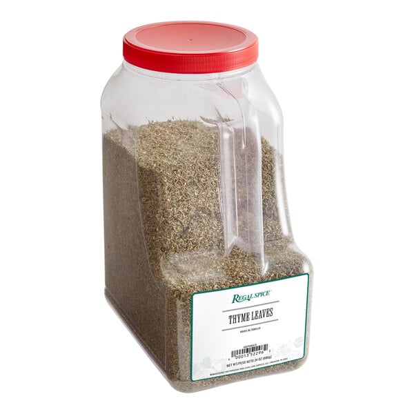 A plastic container of Regal Thyme Leaves with a red and green label.