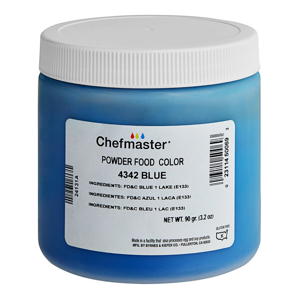 A blue Chefmaster container of dry powder food color with a white lid.