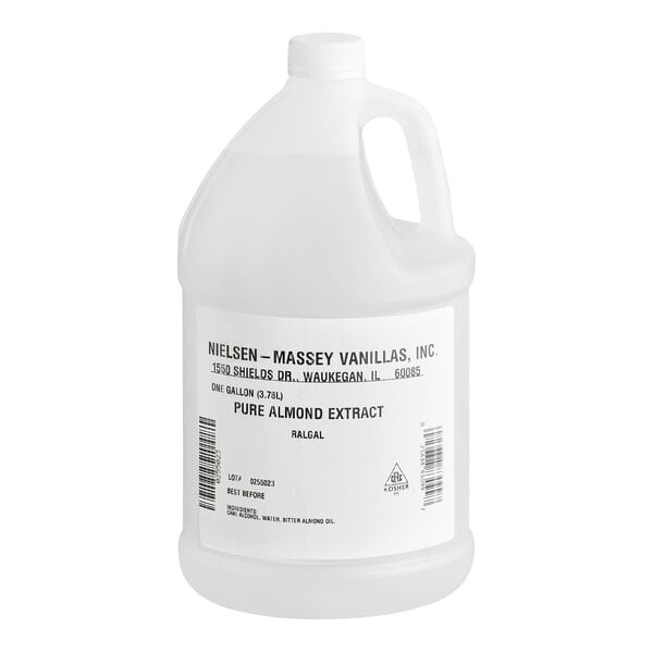 A large white plastic jug with a handle and a white label indicating it contains pure almond extract.