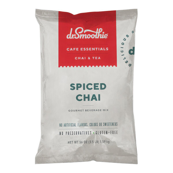 A white bag of Dr. Smoothie Cafe Essentials Spiced Chai Beverage Mix with red and white text.