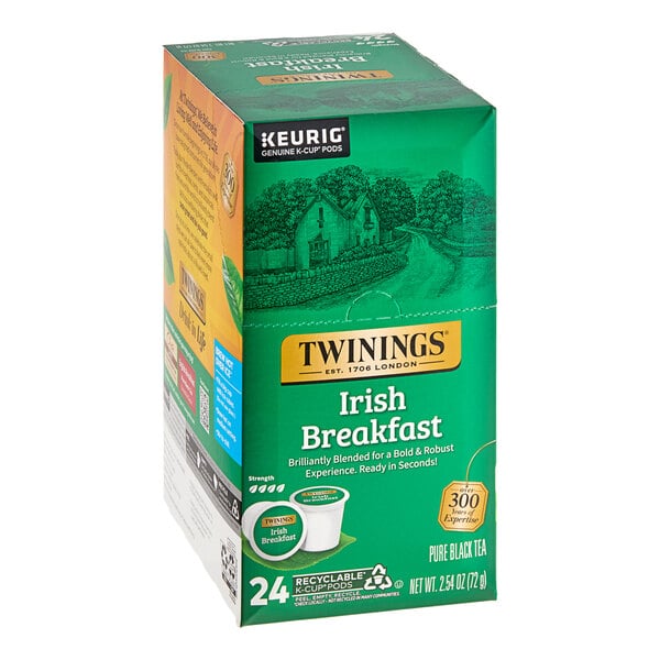A green and yellow box of Twinings Irish Breakfast Tea Single Serve Keurig K-Cup Pods with a picture of a house.