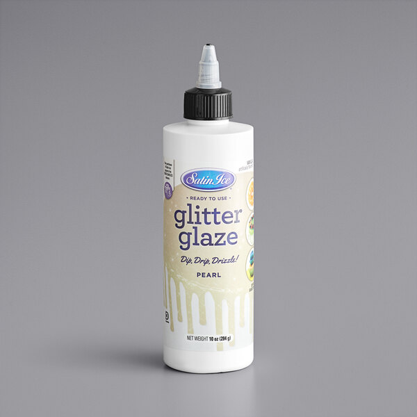 A white bottle of Satin Ice Pearl Vanilla Glitter Glaze with a black label.
