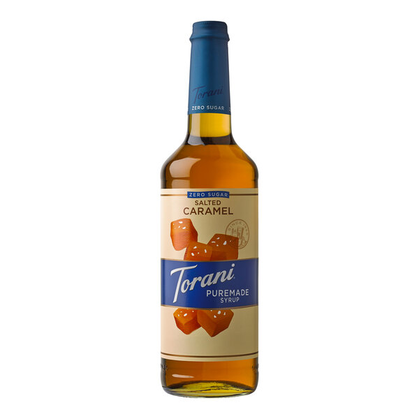 A Torani Puremade Zero Sugar Salted Caramel flavoring syrup bottle with a blue label.