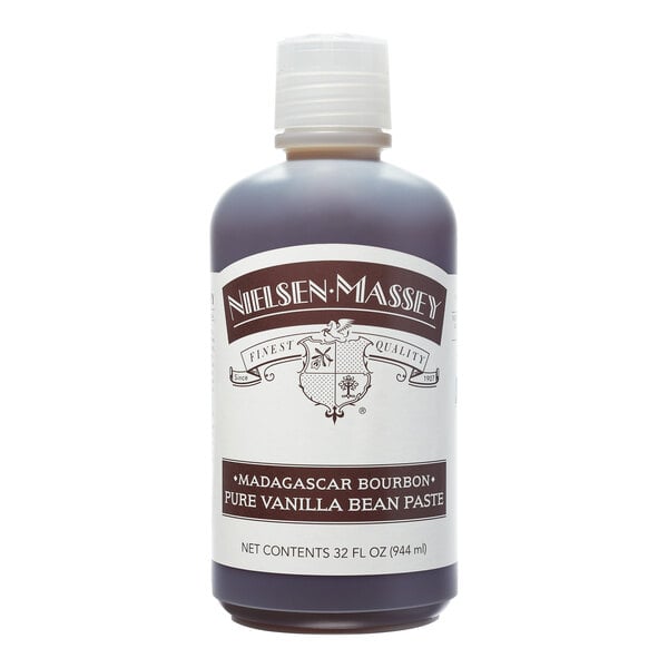 A Nielsen-Massey Madagascar Bourbon Vanilla Paste bottle on a counter.