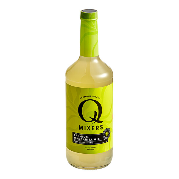 A yellow bottle of Q Mixers Premium Margarita Mix with a green label.