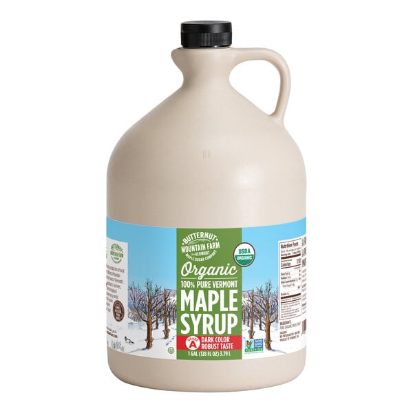 A Butternut Mountain Farm jug of organic maple syrup with a label.