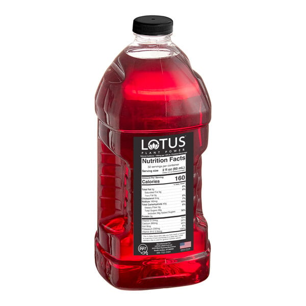A large plastic bottle of Lotus Plant Power Pink Lotus 5:1 Energy Concentrate with a red liquid inside.