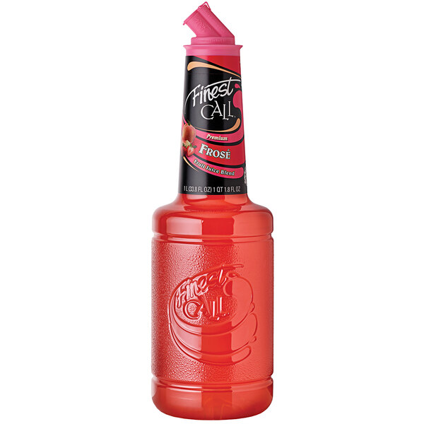A bottle of Finest Call red liquid with a pink lid.