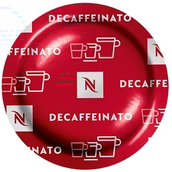A red Nespresso Professional Decaffeinato coffee capsule on a white plate.
