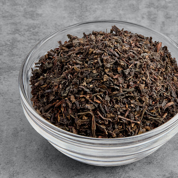 A bowl of Twinings Earl Grey loose leaf tea.