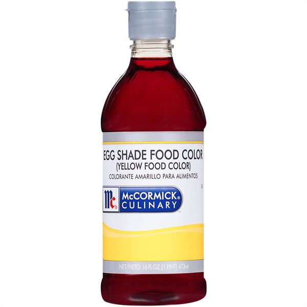 A close up of a McCormick Culinary Egg Yellow Food Color bottle with a label on it.