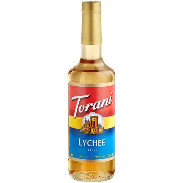 A Torani Lychee Flavoring Syrup 750 mL glass bottle with a label.