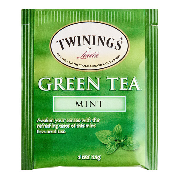 A green and black package of Twinings Green Tea with Mint Tea Bags.