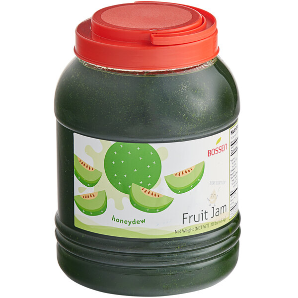 A green jar of Bossen Honeydew Fruit Jam with fruit juice inside.