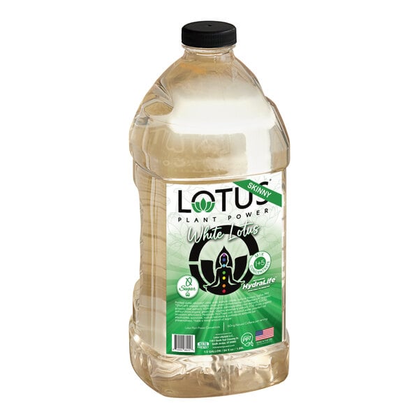 A plastic container of Lotus Plant Power Sugar-Free White Lotus Energy Concentrate with a green label.