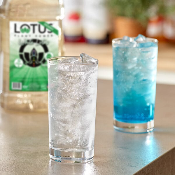 A glass of ice with blue Lotus Plant Power Energy Concentrate.