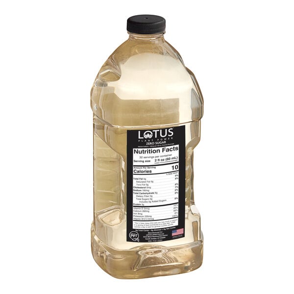 A large clear plastic bottle of Lotus Plant Power Sugar-Free White Lotus 5:1 Energy Concentrate with a black label and black cap.