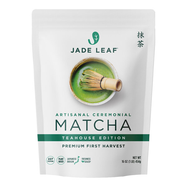 A white resealable bag labeled 'Jade Leaf Artisanal Ceremonial Matcha Teahouse Edition' with an image of a bowl of matcha and a bamboo whisk on the front.