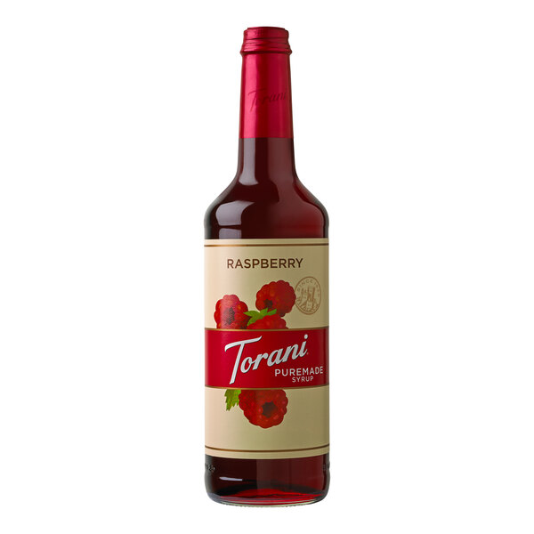 A Torani Puremade Raspberry Flavoring Syrup bottle with a label.