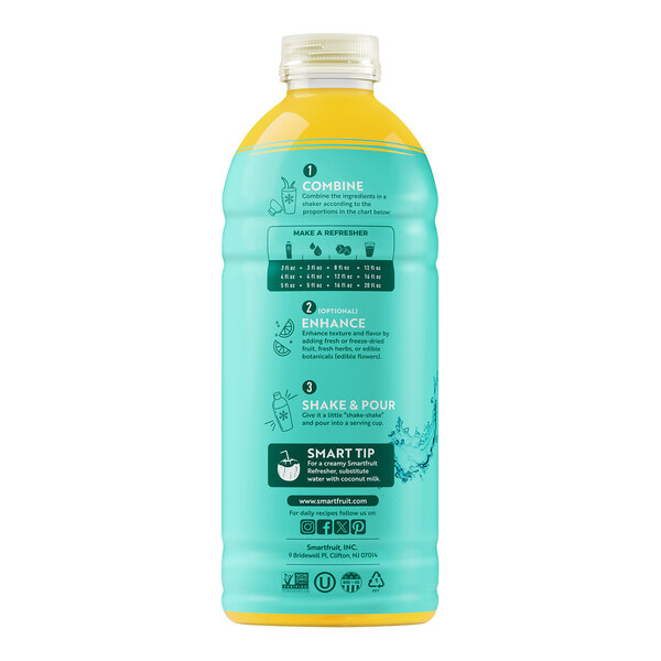 A blue bottle of Smartfruit Revive Star Fruit, Passion Fruit, Mango Refresher juice concentrate with white and black text.