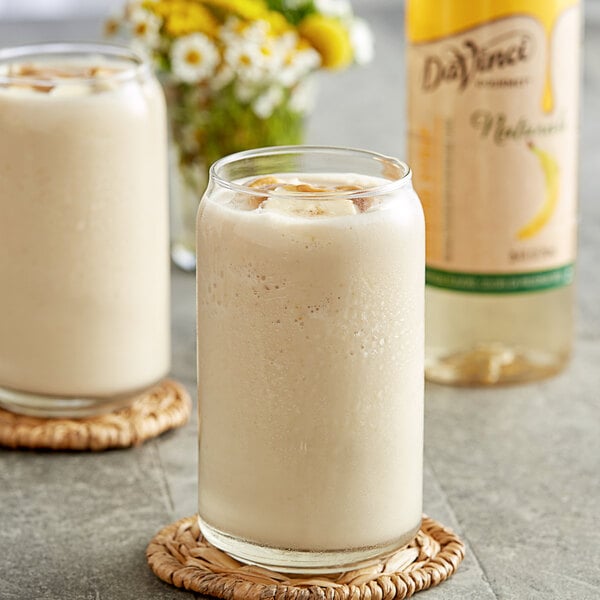 A glass of milkshake with DaVinci Gourmet Banana Syrup and ice.