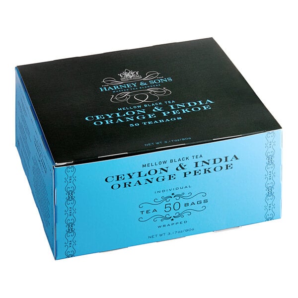 A blue box of Harney & Sons Orange Pekoe Tea Bags with black and white text.