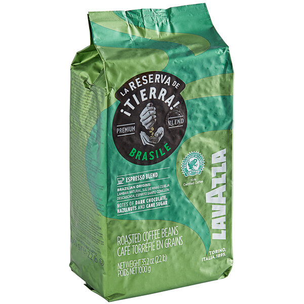 A green bag of Lavazza Tierra! Brasile Intense whole bean coffee on a white background.