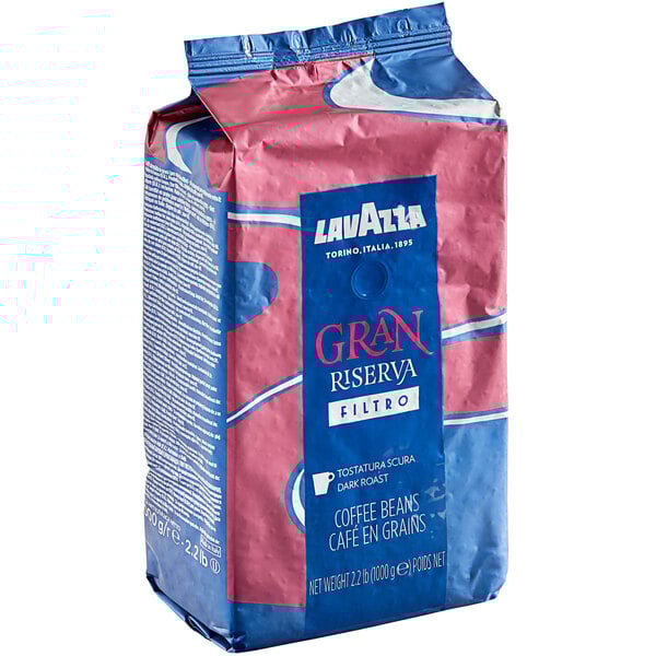 A bag of Lavazza Gran Riserva Filtro whole bean coffee with a blue and pink label.