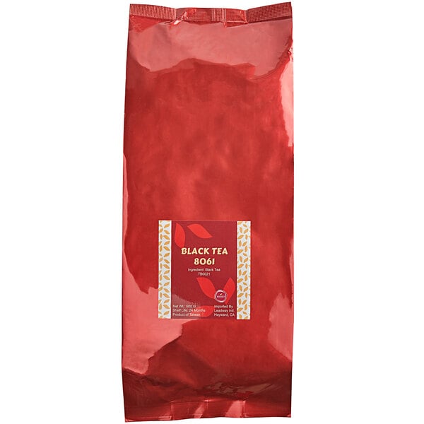 A red bag of Bossen black loose leaf tea with a label.