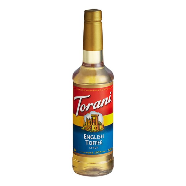 A close up of a Torani English Toffee flavoring syrup bottle with a label.