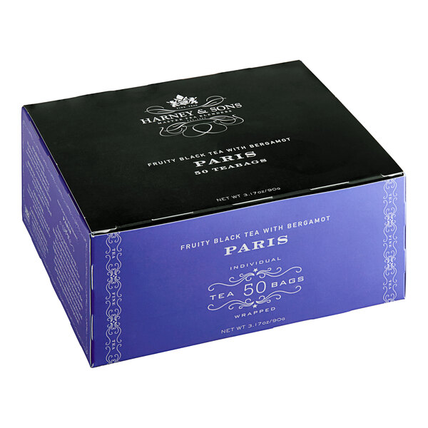A blue box of Harney & Sons Paris tea bags with white text and a purple label.