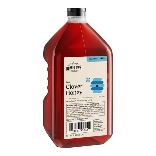 A case of six 5 lb. bottles of Hometown Provisions Clover Honey with a label.