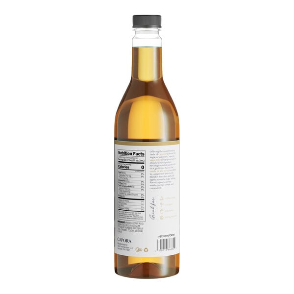 A close-up of a bottle of Capora Sugar Free Caramel Flavoring Syrup with a label.