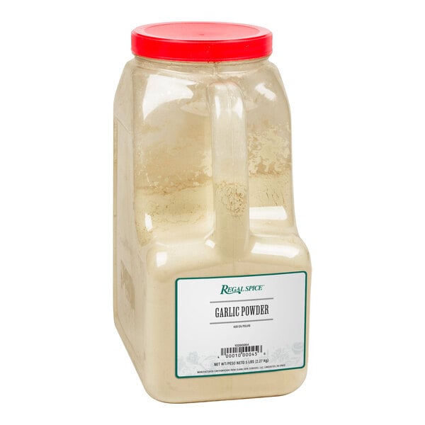 A plastic container of Regal Garlic Powder with a red lid.