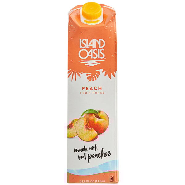 A white box with orange and white Island Oasis branding containing 12 cartons of Island Oasis Peach Puree with yellow caps.