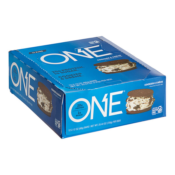 A blue box of ONE Cookies and Creme Protein Bars.