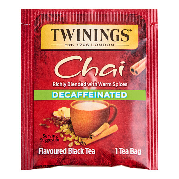 A red box of Twinings Decaffeinated Chai Tea Bags with a close-up of the logo.