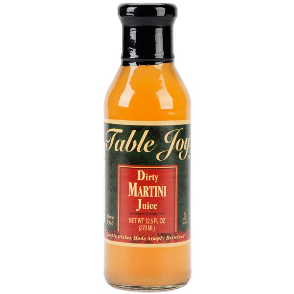 A Table Joy bottle of Dirty Olive Martini Splash on a table with a black lid.