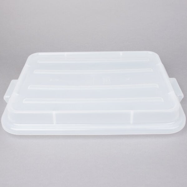 A white rectangular Vollrath plastic lid with a black border on a gray background.