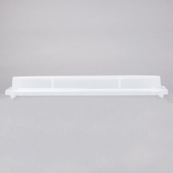 A white plastic lid with a clear raised surface.