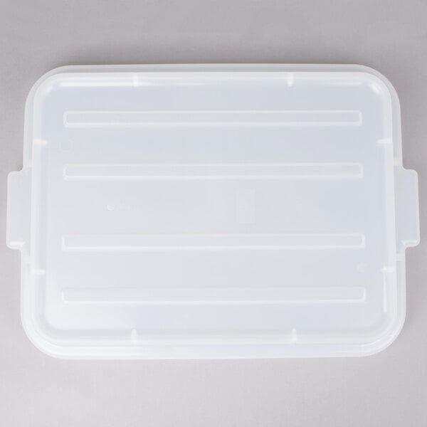 A clear plastic Vollrath Color-Mate lid on a white plastic container.