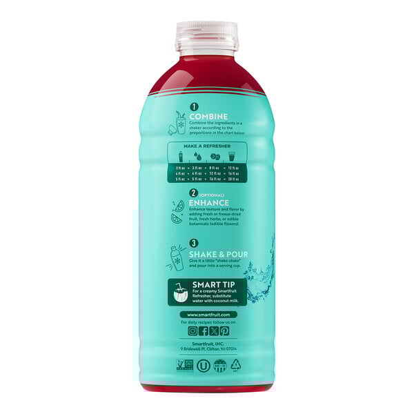 A blue bottle of Smartfruit Recharge Dragon Fruit and Elderberry juice concentrate with white and black text.