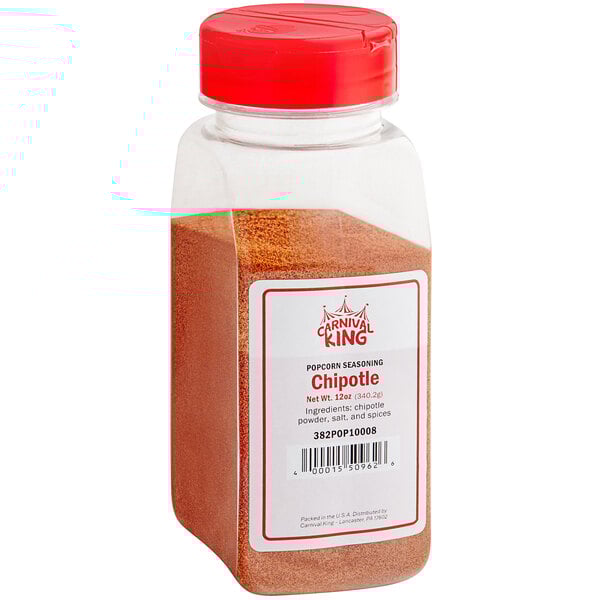 A plastic container with a red lid of Carnival King Chipotle Popcorn Seasoning.