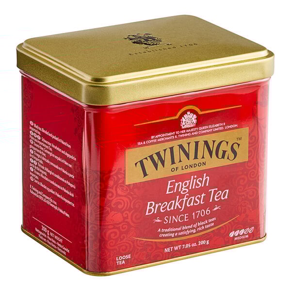 A red and gold Twinings English Breakfast loose leaf tea tin.